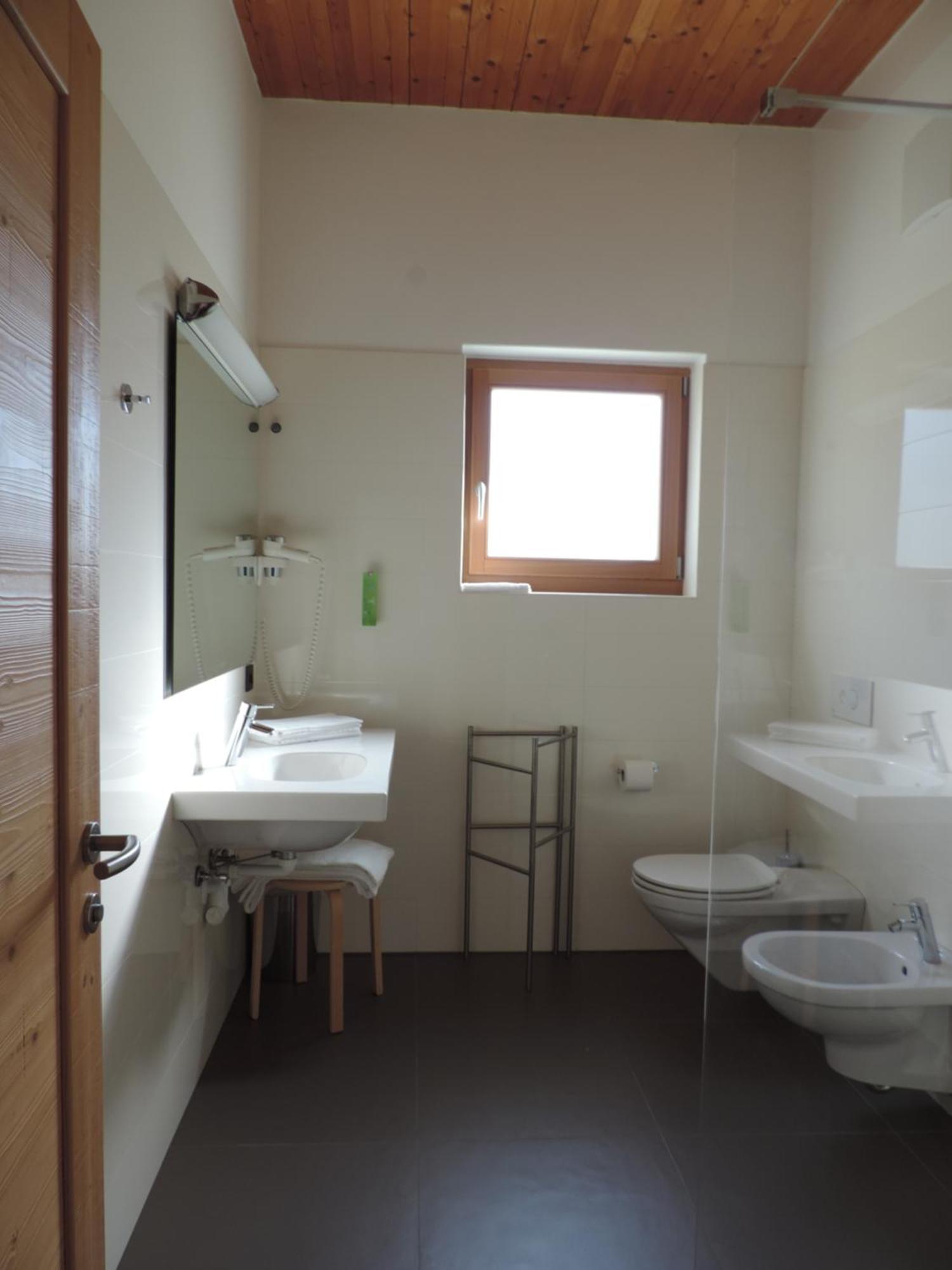 Hotel Garnì Tuttotondo Levico Terme Camera foto